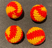 Crocheted Balls Acrylic 4 pk, 3/4 inch - Swirl Red/Yellow M8