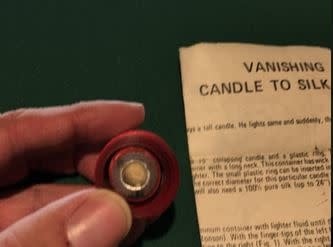 USED Vanishing Candle To Silk, Red by Fantasio (ring missing)